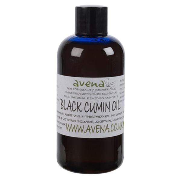 A bottle of Cold pressed black cumin oil also known as Nigella sativa in latin.